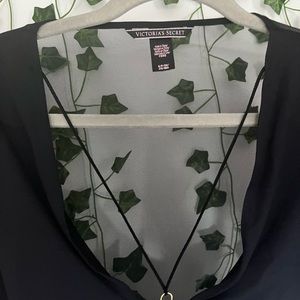 Mesh bodysuit long sleeve black with tiny gold ring in the middle of chest